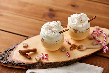 Image showing glasses of eggnog with whipped cream and anise