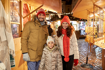 Image showing happy family at christmas market in city