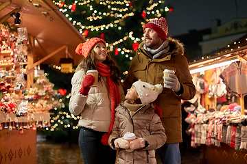 Image showing family with takeaway drinks at christmas market