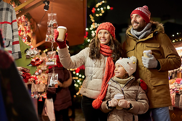 Image showing family with takeaway drinks at christmas market