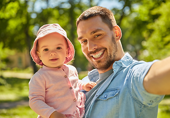 Image showing happy father taking selfie with baby daughter