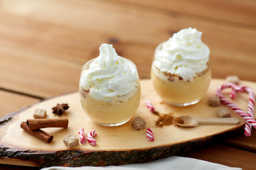 Image showing glasses of eggnog with whipped cream and anise