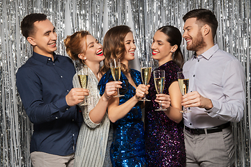 Image showing happy friends toasting champagne glasses at party