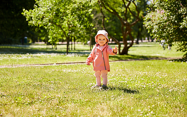 Image showing happy little baby girl at park in summer