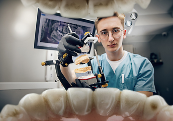 Image showing Doctor looking into the mouth, checking, examining teeth