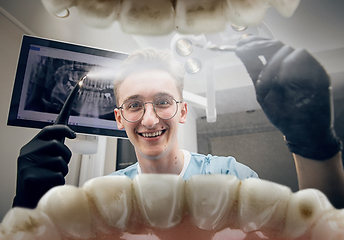 Image showing Doctor looking into the mouth, checking, examining teeth