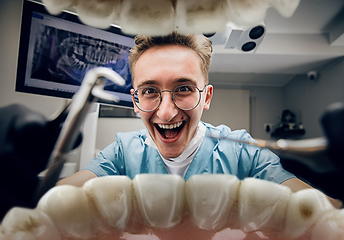 Image showing Doctor looking into the mouth, checking, examining teeth