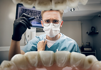 Image showing Doctor looking into the mouth, checking, examining teeth