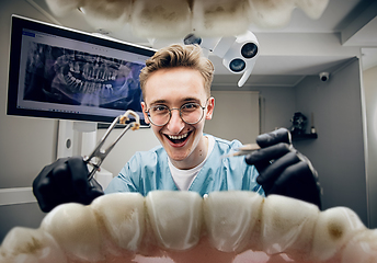 Image showing Doctor looking into the mouth, checking, examining teeth