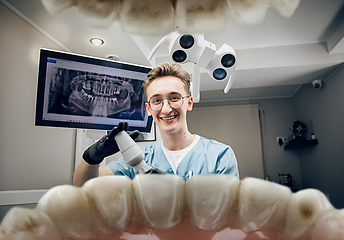 Image showing Doctor looking into the mouth, checking, examining teeth