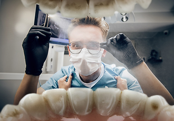 Image showing Doctor looking into the mouth, checking, examining teeth