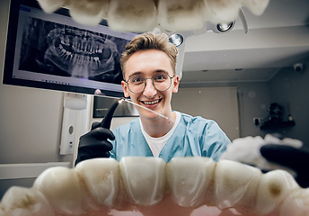 Image showing Doctor looking into the mouth, checking, examining teeth