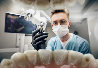 Image showing Doctor looking into the mouth, checking, examining teeth