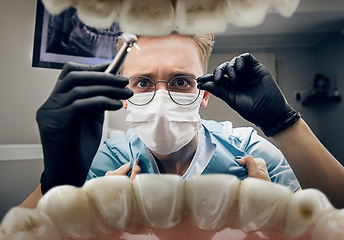 Image showing Doctor looking into the mouth, checking, examining teeth