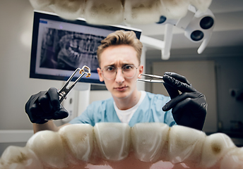 Image showing Doctor looking into the mouth, checking, examining teeth