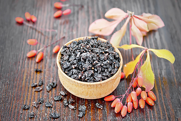 Image showing Barberry dried in bowl on wooden board