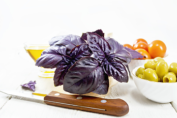 Image showing Basil purple in mortar on light board