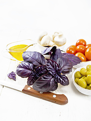 Image showing Basil purple in mortar on table