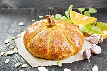 Image showing Bread pumpkin on a dark board