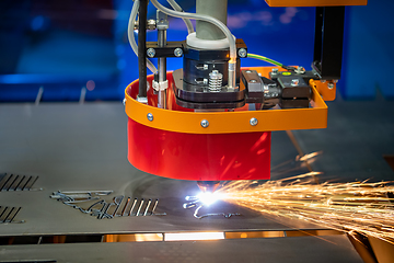 Image showing CNC Laser cutting of metal, modern industrial technology.