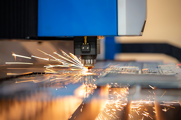 Image showing CNC Laser cutting of metal, modern industrial technology.