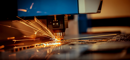 Image showing CNC Laser cutting of metal, modern industrial technology.