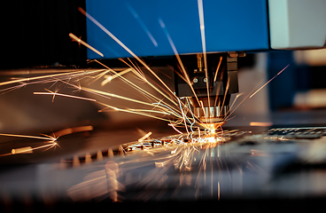 Image showing CNC Laser cutting of metal, modern industrial technology.