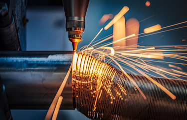 Image showing CNC Laser cutting of metal, modern industrial technology.