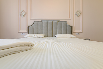 Image showing Beige and brown modern bedroom interior with double bed