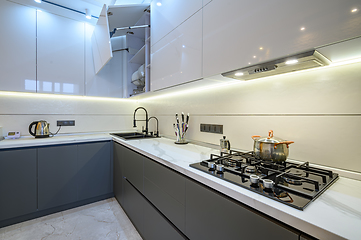 Image showing Luxury white and dark grey modern kitchen interior