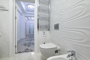 Image showing Modern luxury white and chrome bathroom