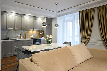 Image showing Luxury grey and white modern kitchen and living room