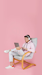 Image showing Caucasian man\'s portrait isolated on pink studio background with copyspace