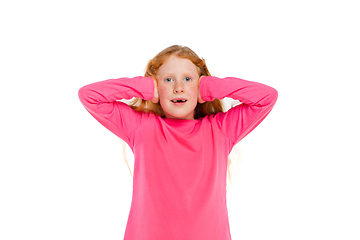 Image showing Happy redhair girl isolated on white studio background. Looks happy, cheerful, sincere. Copyspace. Childhood, education, emotions concept