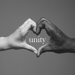 Image showing African and caucasian hands gesturing on gray studio background, tolerance and equality concept