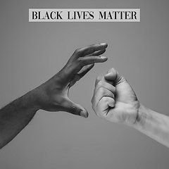 Image showing African and caucasian hands gesturing on gray studio background, tolerance and equality concept