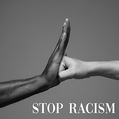 Image showing African and caucasian hands gesturing on gray studio background, tolerance and equality concept