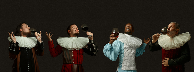 Image showing Medieval men as a royalty persons in vintage clothing on dark background. Concept of comparison of eras, modernity and renaissance, baroque style.