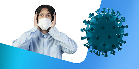 Image showing Man in protective face mask isolated on white and fluid blue studio background. New rules of COVID spreading prevention