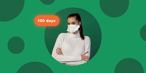 Image showing Woman in protective face mask on bright studio background. New rules of COVID spreading prevention