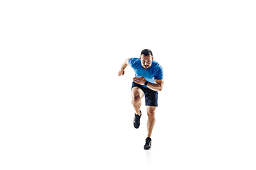 Image showing Caucasian professional male runner, athlete training isolated on white studio background. Copyspace for ad.