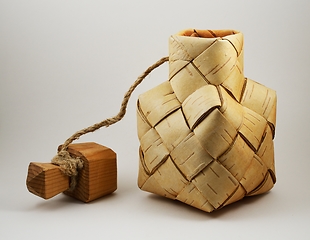 Image showing a traditional salt container woven from birch bark with a wooden