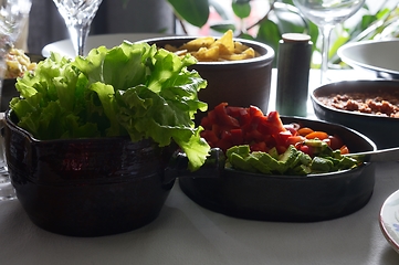 Image showing green salad and side dish