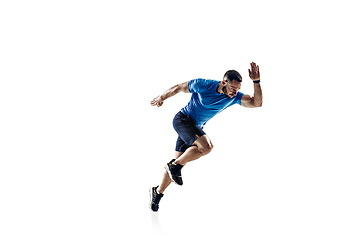 Image showing Caucasian professional male runner, athlete training isolated on white studio background. Copyspace for ad.