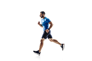 Image showing Caucasian professional male runner, athlete training isolated on white studio background. Copyspace for ad.