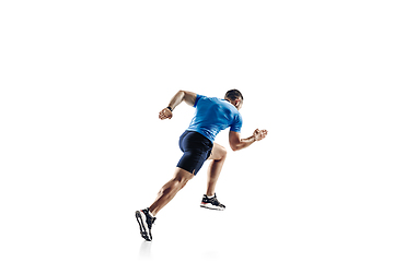 Image showing Caucasian professional male runner, athlete training isolated on white studio background. Copyspace for ad.