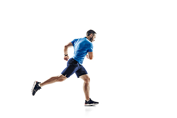 Image showing Caucasian professional male runner, athlete training isolated on white studio background. Copyspace for ad.