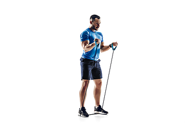 Image showing Caucasian professional male runner, athlete training isolated on white studio background. Copyspace for ad.