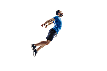 Image showing Caucasian professional male runner, athlete training isolated on white studio background. Copyspace for ad.