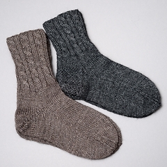 Image showing  two pair of woolen knitted socks on a neutral background